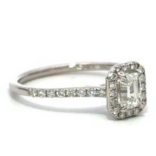79 - A Platinum and Diamond Ring. Centre diamond - 0.51ct - VS2. Diamond accents - 0.24ctw. Size M. 3g to... 