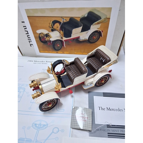 66 - A Franklin Mint 1904 Mercedes Simplex. 1/24th scale. Very good condition with paperwork. Box has som... 