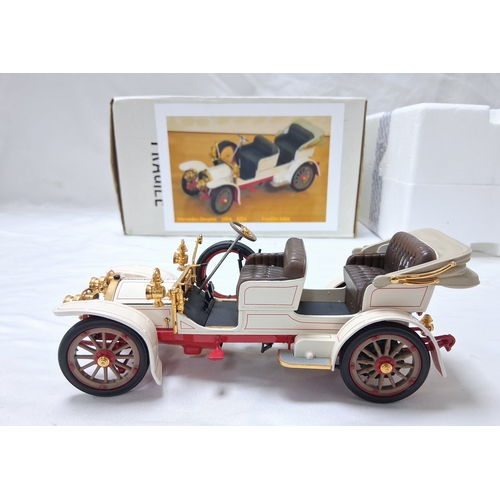 66 - A Franklin Mint 1904 Mercedes Simplex. 1/24th scale. Very good condition with paperwork. Box has som... 