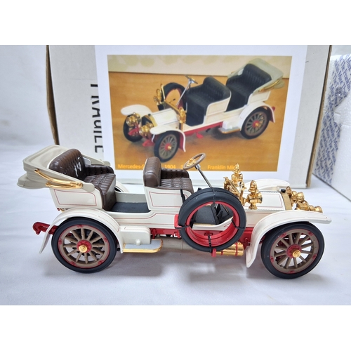 66 - A Franklin Mint 1904 Mercedes Simplex. 1/24th scale. Very good condition with paperwork. Box has som... 