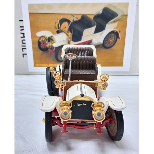 66 - A Franklin Mint 1904 Mercedes Simplex. 1/24th scale. Very good condition with paperwork. Box has som... 