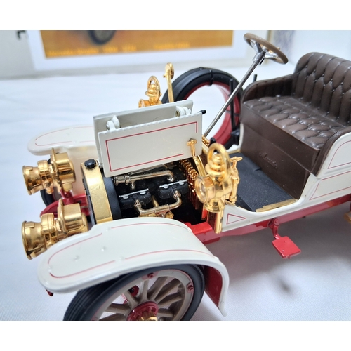 66 - A Franklin Mint 1904 Mercedes Simplex. 1/24th scale. Very good condition with paperwork. Box has som... 