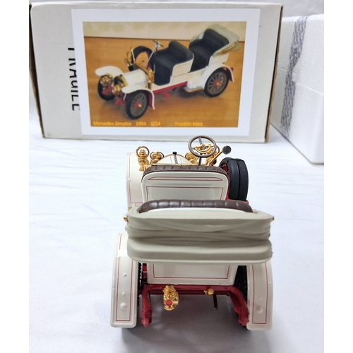 66 - A Franklin Mint 1904 Mercedes Simplex. 1/24th scale. Very good condition with paperwork. Box has som... 