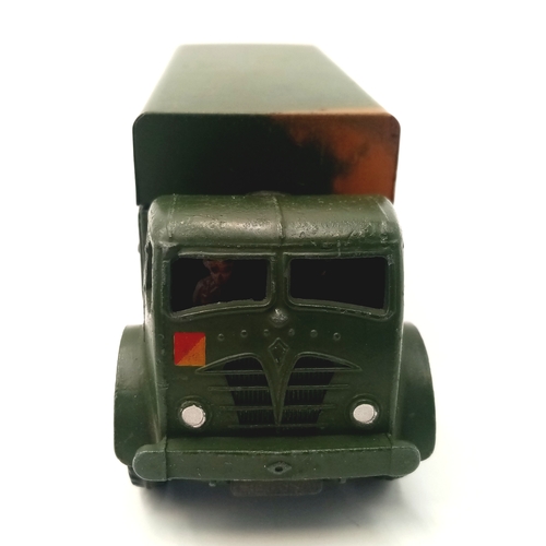 107 - Two Dinky toys military vehicles, 621 and 622. Some play wear. Please see photos.