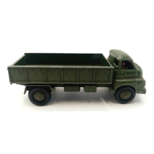 107 - Two Dinky toys military vehicles, 621 and 622. Some play wear. Please see photos.