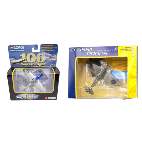 312 - Two boxed Corgi aeroplane models. A Spitfire and a Mustang P-51.  Good condition. Please see photos.