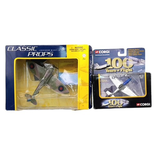 312 - Two boxed Corgi aeroplane models. A Spitfire and a Mustang P-51.  Good condition. Please see photos.