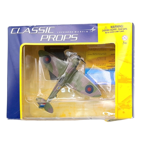 312 - Two boxed Corgi aeroplane models. A Spitfire and a Mustang P-51.  Good condition. Please see photos.