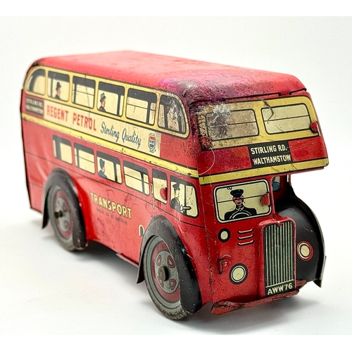 341 - A vintage 1950's, Wells Brimtoy, clockwork, tin plate London bus. Please see photos.
