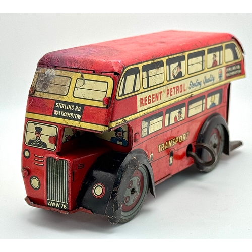 341 - A vintage 1950's, Wells Brimtoy, clockwork, tin plate London bus. Please see photos.