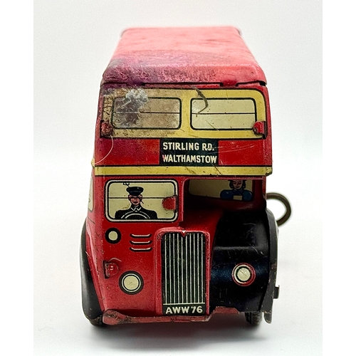 341 - A vintage 1950's, Wells Brimtoy, clockwork, tin plate London bus. Please see photos.