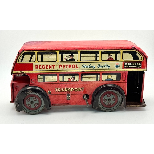 341 - A vintage 1950's, Wells Brimtoy, clockwork, tin plate London bus. Please see photos.