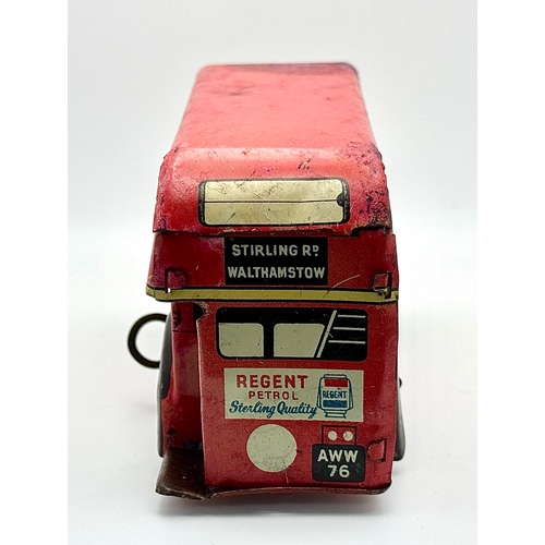 341 - A vintage 1950's, Wells Brimtoy, clockwork, tin plate London bus. Please see photos.