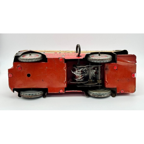 341 - A vintage 1950's, Wells Brimtoy, clockwork, tin plate London bus. Please see photos.