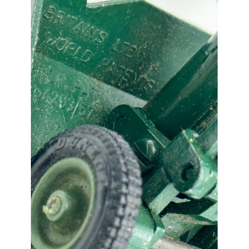 335 - Two vintage Britains cannons and a trailer.