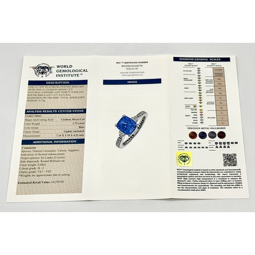 113 - A Dazzling 950 Platinum Sapphire and Diamond Ring. A 1.75ct cushion mixed cut sapphire with thirty-f... 