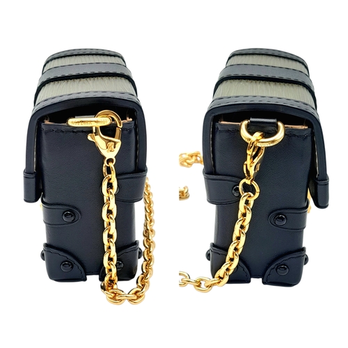 64 - A Louis Vuitton Petite Malle Style Mini Chain Bag. Crafted in green textured leather panels with bla... 