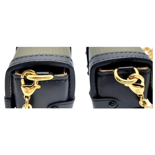 64 - A Louis Vuitton Petite Malle Style Mini Chain Bag. Crafted in green textured leather panels with bla... 