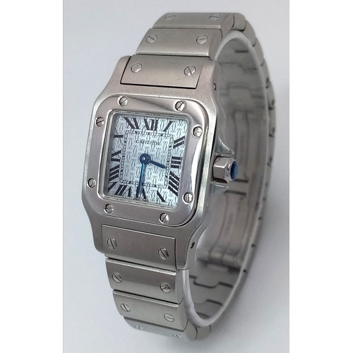 68 - A Cartier Santos Galbee Quartz Ladies Watch. Stainless steel bracelet and case - 24 x 35mm. Ice blue... 