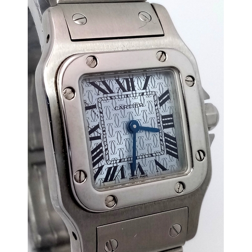 68 - A Cartier Santos Galbee Quartz Ladies Watch. Stainless steel bracelet and case - 24 x 35mm. Ice blue... 