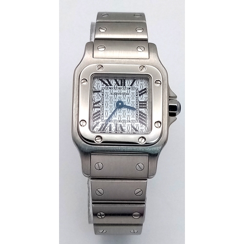 68 - A Cartier Santos Galbee Quartz Ladies Watch. Stainless steel bracelet and case - 24 x 35mm. Ice blue... 