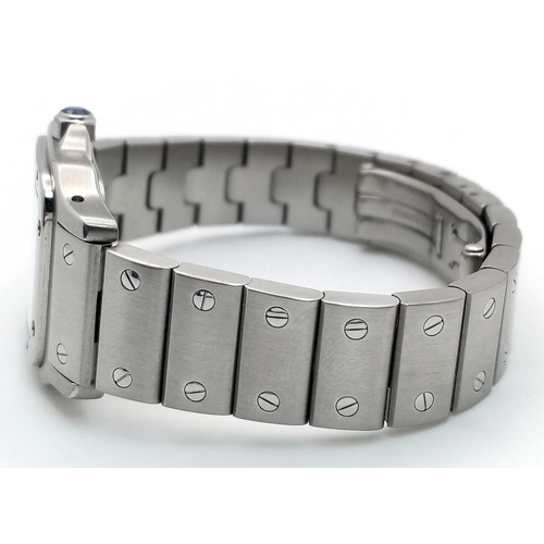 68 - A Cartier Santos Galbee Quartz Ladies Watch. Stainless steel bracelet and case - 24 x 35mm. Ice blue... 