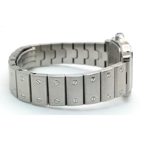 68 - A Cartier Santos Galbee Quartz Ladies Watch. Stainless steel bracelet and case - 24 x 35mm. Ice blue... 