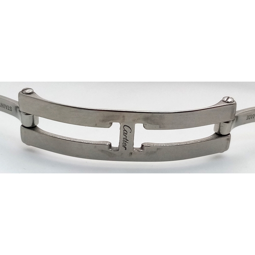 68 - A Cartier Santos Galbee Quartz Ladies Watch. Stainless steel bracelet and case - 24 x 35mm. Ice blue... 