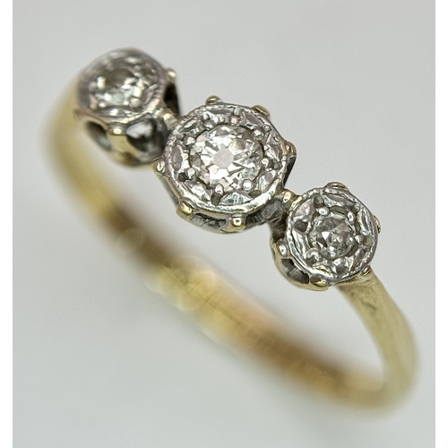 70 - Antique 18 CARAT GOLD and DIAMOND  RING. Having 3 DIAMONDS set in PLATINUM mounted to top. 1.72 Gram... 