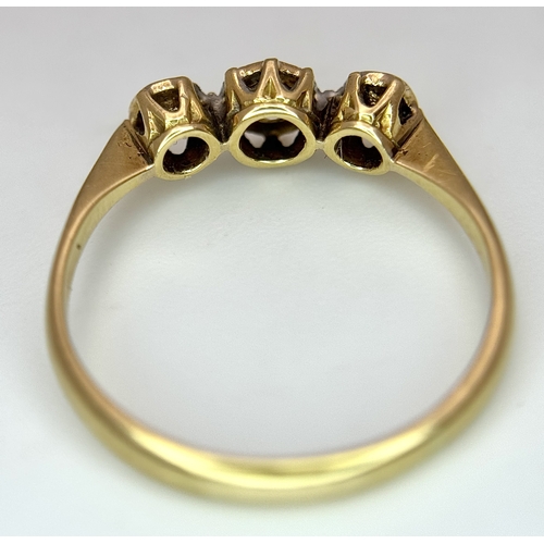 70 - Antique 18 CARAT GOLD and DIAMOND  RING. Having 3 DIAMONDS set in PLATINUM mounted to top. 1.72 Gram... 