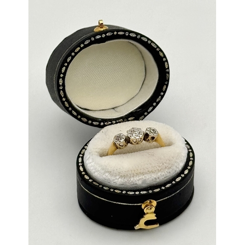 70 - Antique 18 CARAT GOLD and DIAMOND  RING. Having 3 DIAMONDS set in PLATINUM mounted to top. 1.72 Gram... 