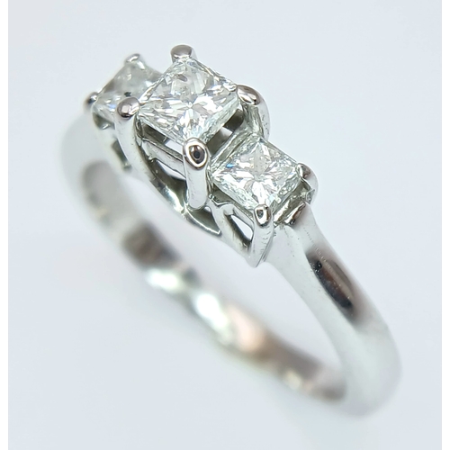 80 - A 14K WHITE GOLD, DIAMOND SET, TRILOGY RING. 0.70 CTW. 3.8G, SIZE M/N. MS RED 1012