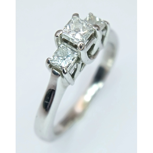 80 - A 14K WHITE GOLD, DIAMOND SET, TRILOGY RING. 0.70 CTW. 3.8G, SIZE M/N. MS RED 1012