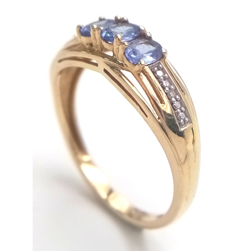 84 - Fully hallmarked 14 CARAT GOLD  TANZANITE RING .2.40 Grams.Size O 1/2 - P.