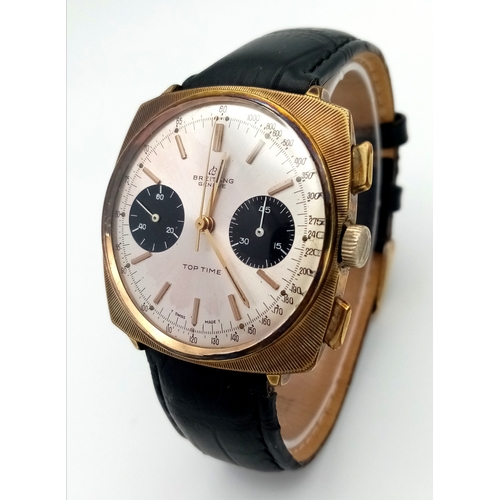 86 - A Vintage Breitling Top Time Gents Chronograph Watch. Black leather strap. Gilded case - 39mm. Silve... 