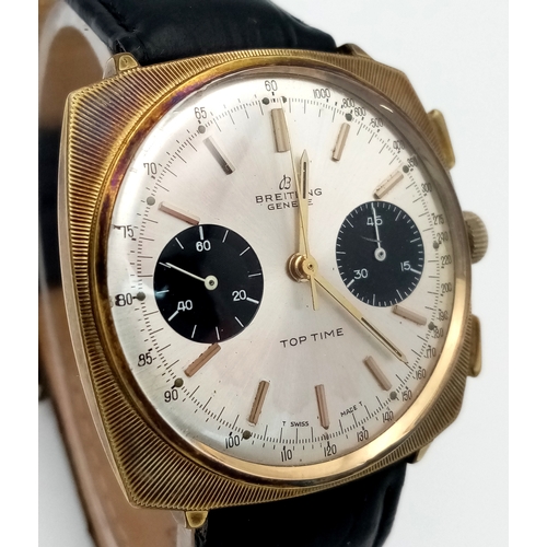 86 - A Vintage Breitling Top Time Gents Chronograph Watch. Black leather strap. Gilded case - 39mm. Silve... 