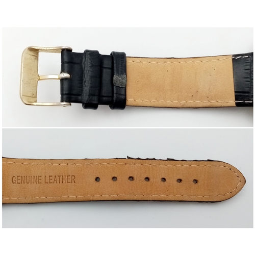 86 - A Vintage Breitling Top Time Gents Chronograph Watch. Black leather strap. Gilded case - 39mm. Silve... 