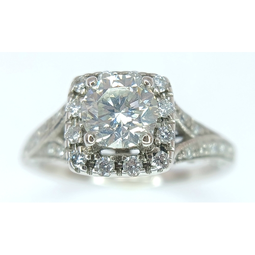 87 - AN 18K WHITE GOLD, DIAMOND SET RING. 1.00 CTW ( MAIN DIAMOND IS 0.65CT ). 3.5G, SIZE L. SPSA 1013