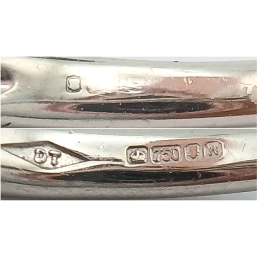 87 - AN 18K WHITE GOLD, DIAMOND SET RING. 1.00 CTW ( MAIN DIAMOND IS 0.65CT ). 3.5G, SIZE L. SPSA 1013