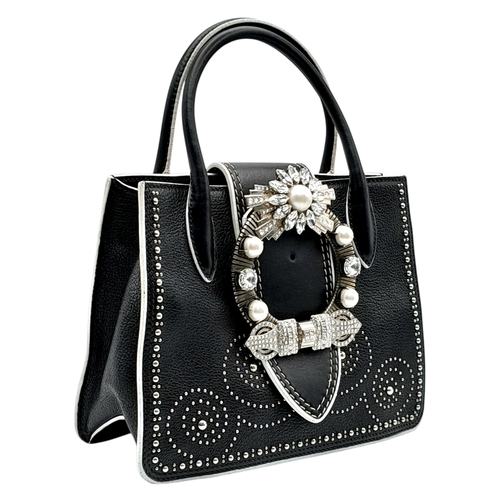 99 - A Miu Miu Black Embellished Handbag. Leather exterior with white stone, faux pearl and stud embellis... 