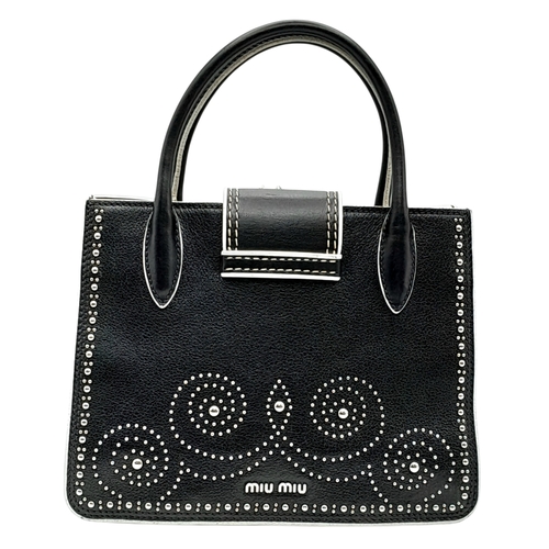 99 - A Miu Miu Black Embellished Handbag. Leather exterior with white stone, faux pearl and stud embellis... 