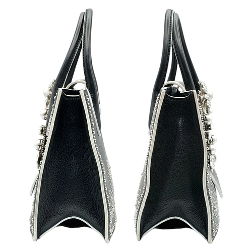 99 - A Miu Miu Black Embellished Handbag. Leather exterior with white stone, faux pearl and stud embellis... 