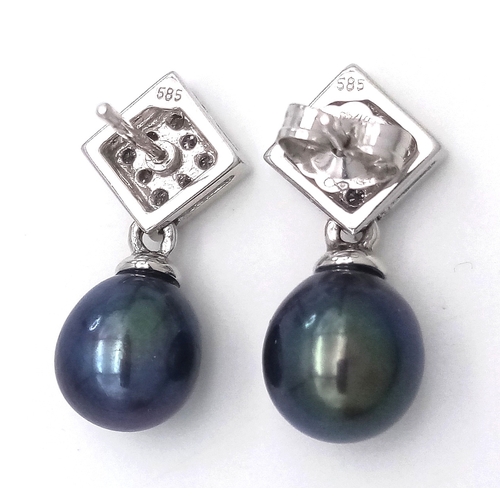 102 - A PAIR OF 14K WHITE GOLD, DIAMOND AND PEARL, DROP EARRINGS. 3.7G. NEEDS ONE BUTTERFLY BACK. MS RED 1... 