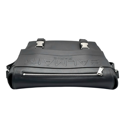 106 - A Balmain Black Leather Messenger Bag. Crafted from smooth black leather with an embossed “BALMAIN P... 