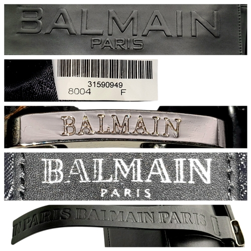 106 - A Balmain Black Leather Messenger Bag. Crafted from smooth black leather with an embossed “BALMAIN P... 