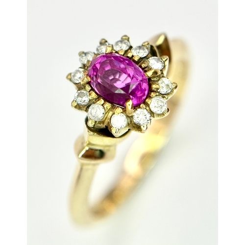 109 - A 14K YELLOW GOLD, DIAMOND AND RED GEMSTONE, CLUSTER RING. 3.3G, SIZE K. A/S 1328 - 1