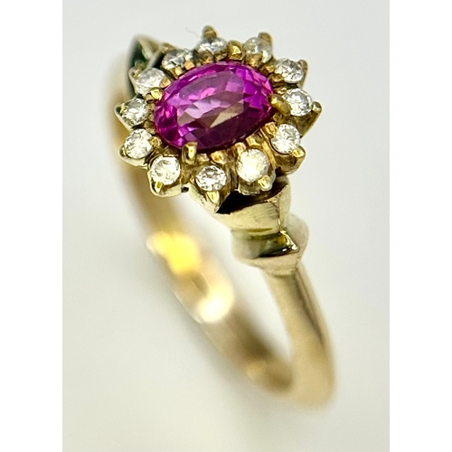 109 - A 14K YELLOW GOLD, DIAMOND AND RED GEMSTONE, CLUSTER RING. 3.3G, SIZE K. A/S 1328 - 1