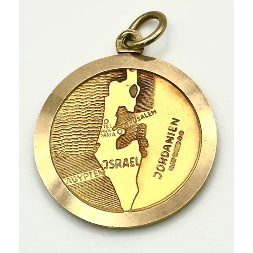 110 - A 9K Yellow Gold Star of David Pendant with Map on Reverse. 
22mm diameter. 7g.