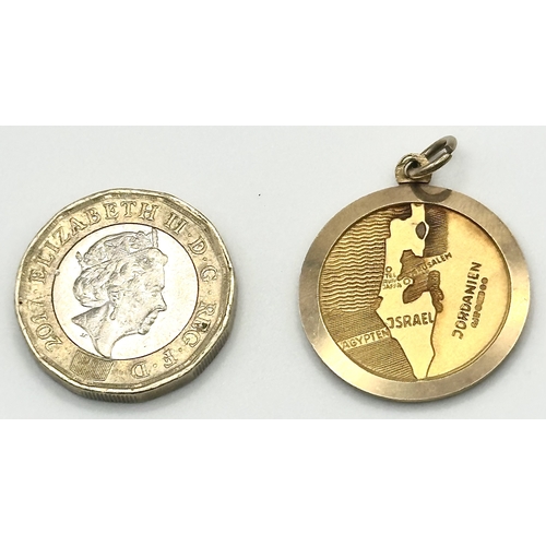110 - A 9K Yellow Gold Star of David Pendant with Map on Reverse. 
22mm diameter. 7g.