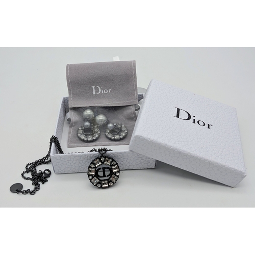 118 - A Christian Dior Limited Edition Grey-Toned Logo and White Stone Necklace and Tribales Earrings Set.... 
